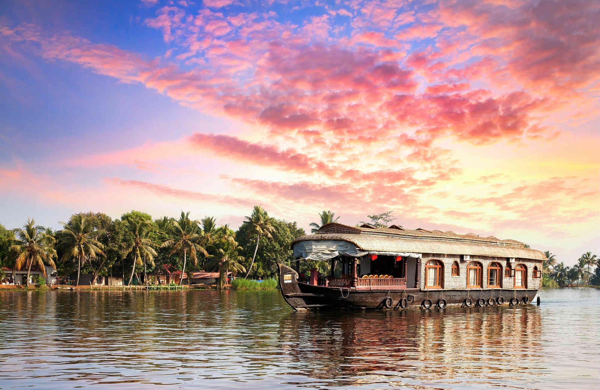 Croisière sur les houseboat du Kerala lors d'un voyage de couple romantique par Amplitudes