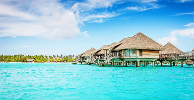 Polynésie - Vue sur les bungalows sur pilotis du Bora Bora Pearl Beach Resort