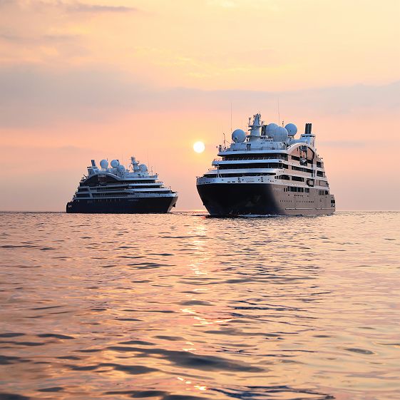 navires ponant explorer face au couche de soleil