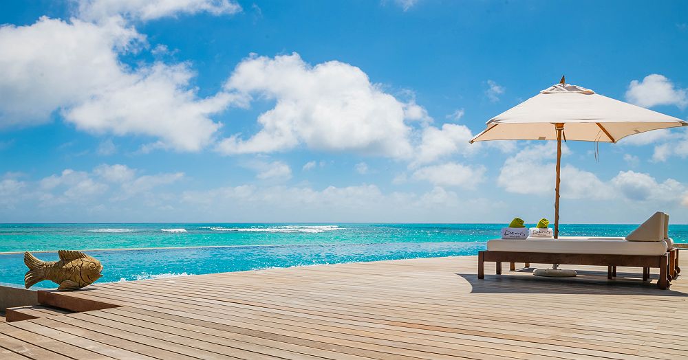 	
Denis Private island - Diapo vue aérienne océan île - Seychelles