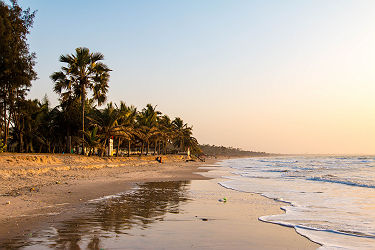 Enjoying the sunset on an idyllic beach in the Gambia