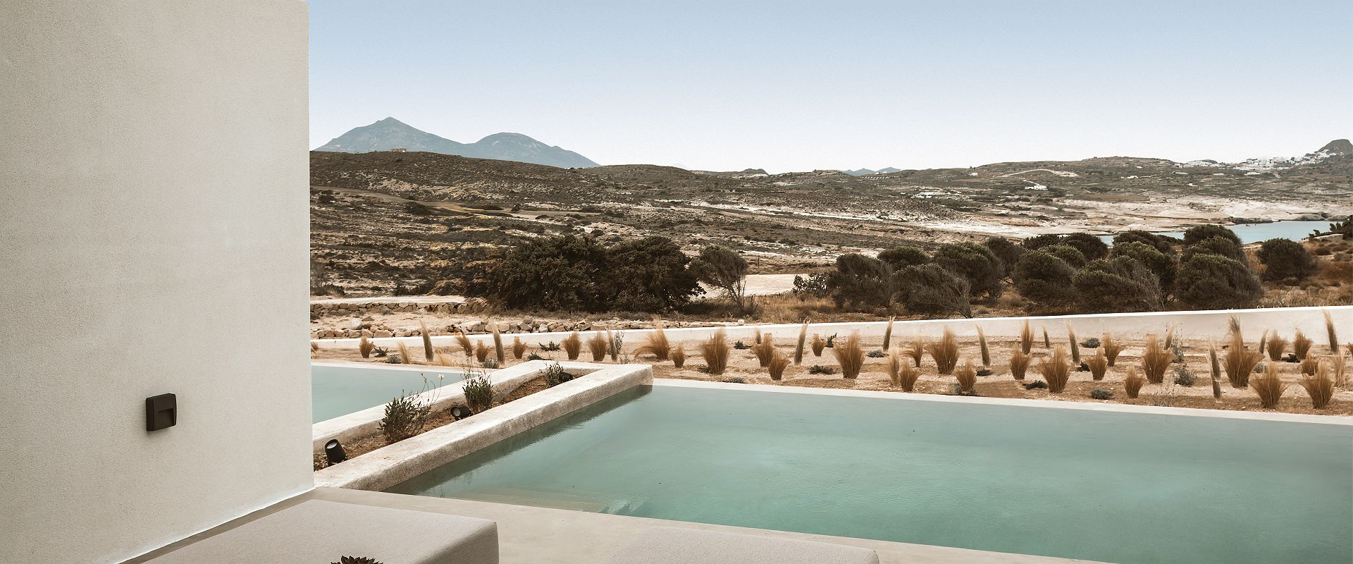 domes white coast milos   white coast suite horizon view   grece 