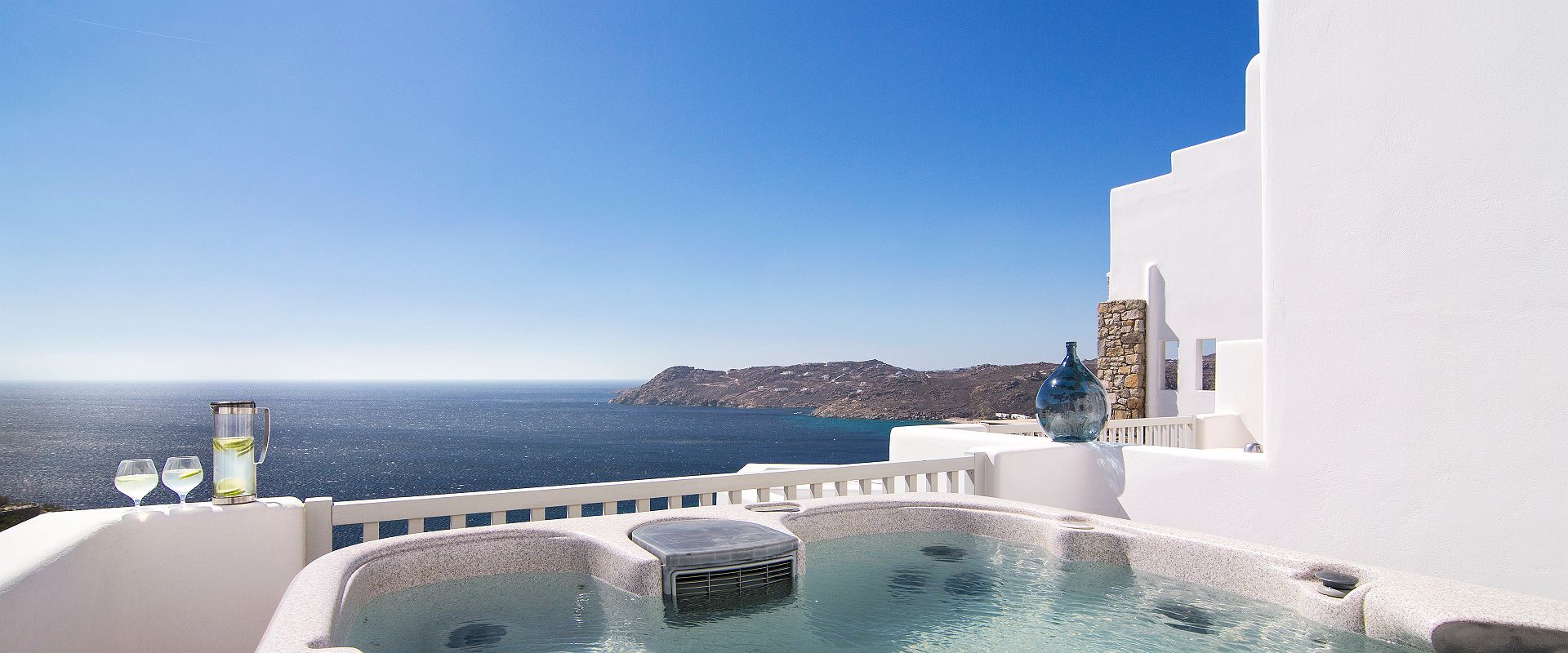 myconian villa collection   prestige guestroom jacuzzi    grece